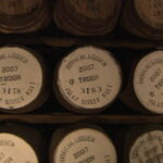 Barrels of Bruichladdich Cask Whisky, each stamped with the year 2007 and details like "Troon" and "Islay Single Malt," showcase a unique whisky investment opportunity for enthusiasts seeking quality and heritage in their portfolio.