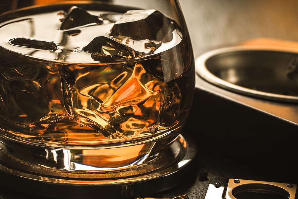 Rare whisky in glass on table
