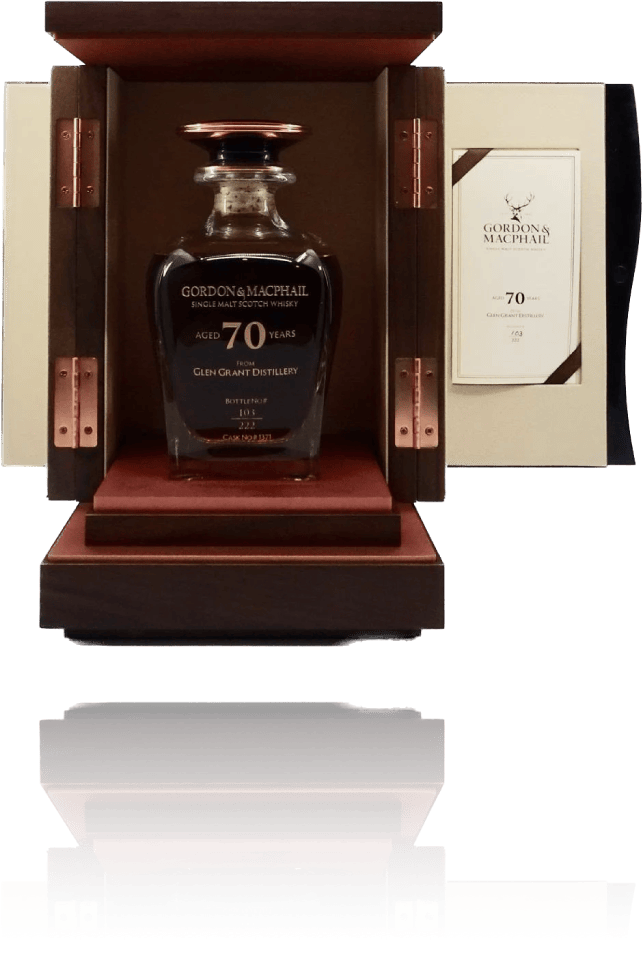 An exquisite bottle of Gordon & MacPhail 70-year-old Glen Grant single malt whisky rests in an open wooden box with elegant copper accents, embodying a rare investment opportunity for discerning connoisseurs seeking high-value brands.